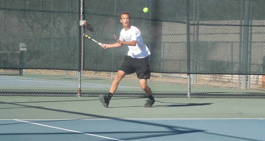 Freshman Chris McDaniels (Tanque Verde HS) and No. 2 doubles partner Francisco Sotelo earned a tie-breaker win and McDaniels won his No. 5 singles match 6-3, 6-0. The Aztecs are now 1-2 on the season. Photo by Raymond Suarez