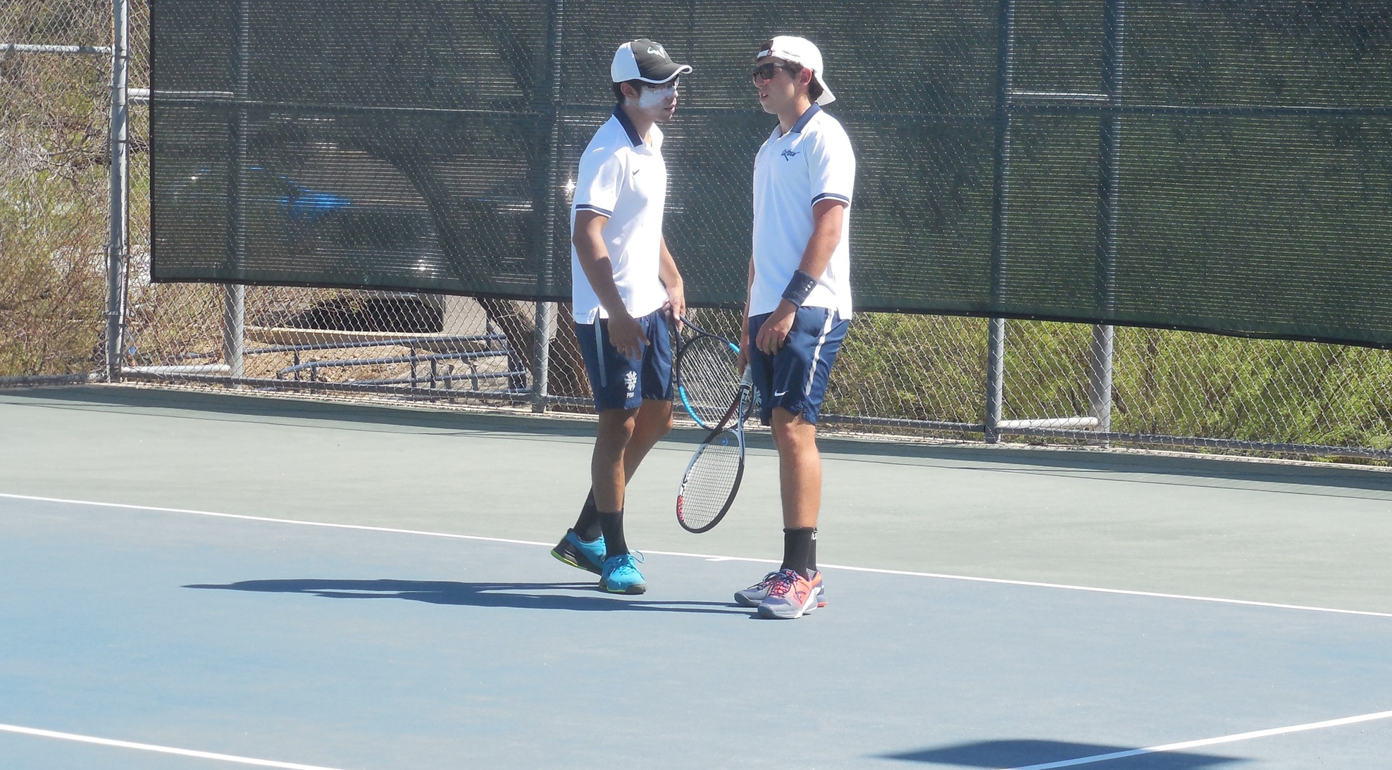 Tomothy Ou and Scott Mantelman advanced in the No. 1 doubles flight after winning a three set match 6-4, 2-6, 6-2 over Andres Graterol and Martin Zarate from Jacksonville College. Photo by Raymond Suarez