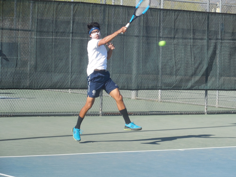 Sophomore Tomothy Ou earned wins in singles and doubles play but the Aztecs dropped a close match to No. 24 Glendale Community College 5-4. The Aztecs are now 1-3 on the season. Photo by Raymond Suarez