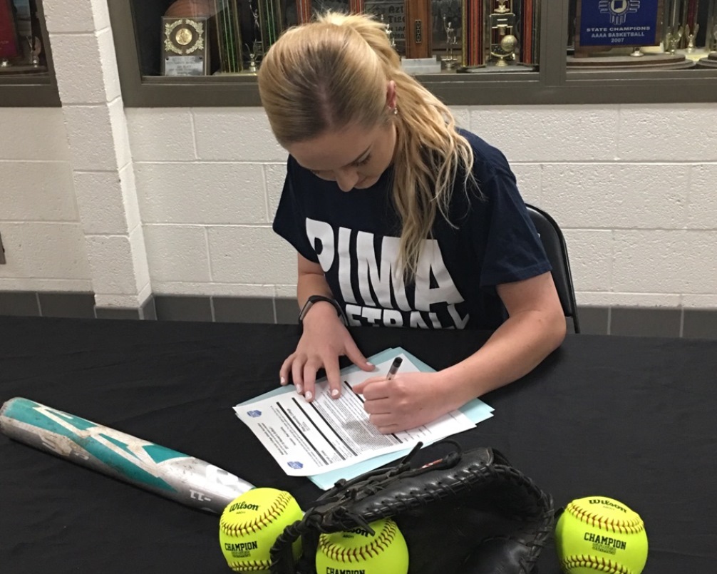 Sarrah Jones signing to play Pima softball for the 2017-18 season/Photo courtesy of Sarrah Jones