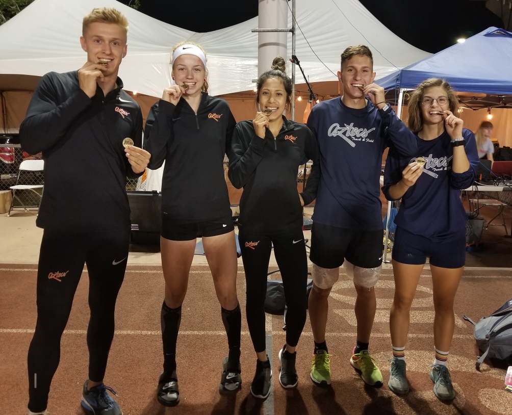 The Aztecs track & field team took home seven individual titles. Left to right: Seth Jarus (Long and Triple Jump), Hailey Myles (Triple Jump), Anahiramar Lopez (Long Jump), Collin Dylla (800 meters) and Katherine Bruno (3,000 steeplechase and 1,500 meters). Photo by Raymond Suarez