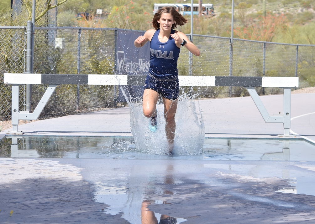 Freshman Katherine Bruno (Canyon del Oro HS) set a national qualifying time in her third event at the Mesa T-Bird Invitational. She took first place in the 5,000 meter race with a time of 18:44.76. She has national qualifying times in the 1,500 meters and the 3,000 meter steeplechase. Photo by Ben Carbajal.