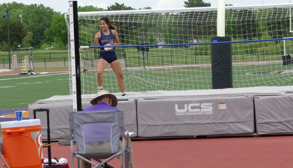 Freshman Anahiramar Lopez pumps her fist after clearing a jump. Lopez took third in the women's high jump with a mark of 5-feet, 6-inches. She earned All-American status with her finish. Photo courtesy of Marybeth Idoux