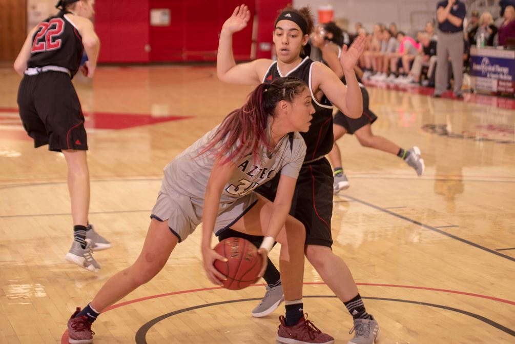 Sophomore Shauna Bribiescas (Dobson HS) scored 12 of her 16 points in the fourth quarter as the Aztecs rallied to beat Lake Michigan College 81-79 in the opening round of the NJCAA Division II Tournament. Bribiescas had her 12th double-double as she also grabbed 11 rebounds. The Aztecs play Kansas City Kansas Community College on Wednesday at 6:00 p.m. (CT); 4:00 p.m. (MST). Photo by Brandon Cone/North Arkansas College