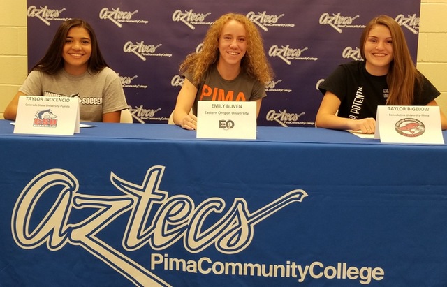 Taylor Inocencio, Emily Bliven and Taylor Bigelow will continue their education and collegiate careers at te next level as they signed their four-year letters of intent. Inocencio will play at NCAA Division II CSU-Pueblo, Bliven will play at NAIA school Eastern Oregon University and Bigelow will go to NAIA's Benedictine University-Mesa. Photo by Raymond Suarez