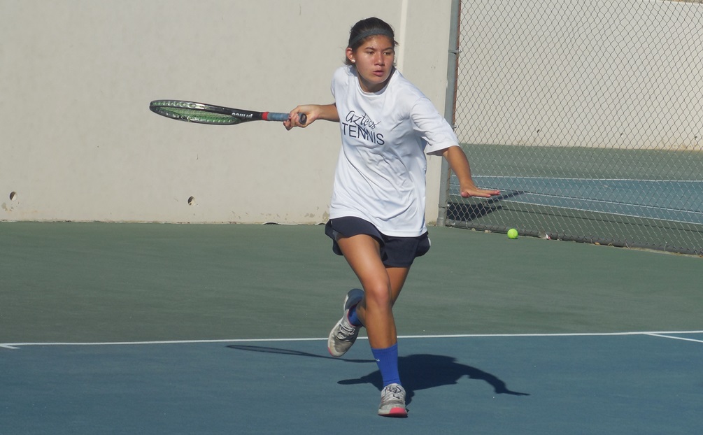 Freshman Ashley Fitzsimmons was a bright spot for the Aztecs as she earned wins in doubles and singles. She helped doubles partner Jayme Shafer win 8-3 at No. 3 doubles. She won her singles match 6-1, 6-4 at No. 5 singles. Photo by Raymond Suarez