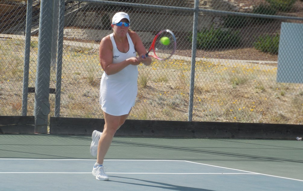 Freshman Meghan Houk advanced to the consolation finals in the No. 3 singles flight after she earned two wins. She will play Ksenija Dmitrovic in the finals on Wednesday. Photo by Raymond Suarez