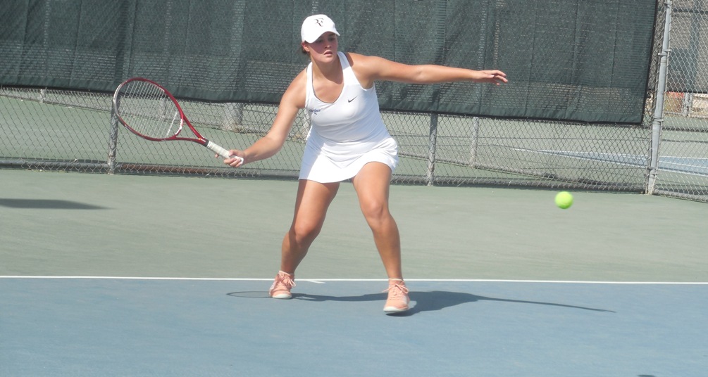 Sophomore Emma Oropeza (Nogales HS) played two close sets but beat Kelly Slattery at No. 1 singles 7-6, 6-4. The Aztecs beat Paradise Valley Community College 9-0 to complete an undefeated record at the West Campus Tennis Courts. The Aztecs finished the regular season at 7-1. Photo by Raymond Suarez