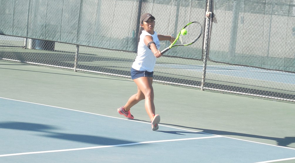 Sophomore Janine Fernando (Sabino HS) won her singles match 6-0, 6-0 and along with No. 1 doubles partner Emma Oropeza won 8-1. The Aztecs are 3-0 and will hit the road on Thursday. Photo by Raymond Suarez