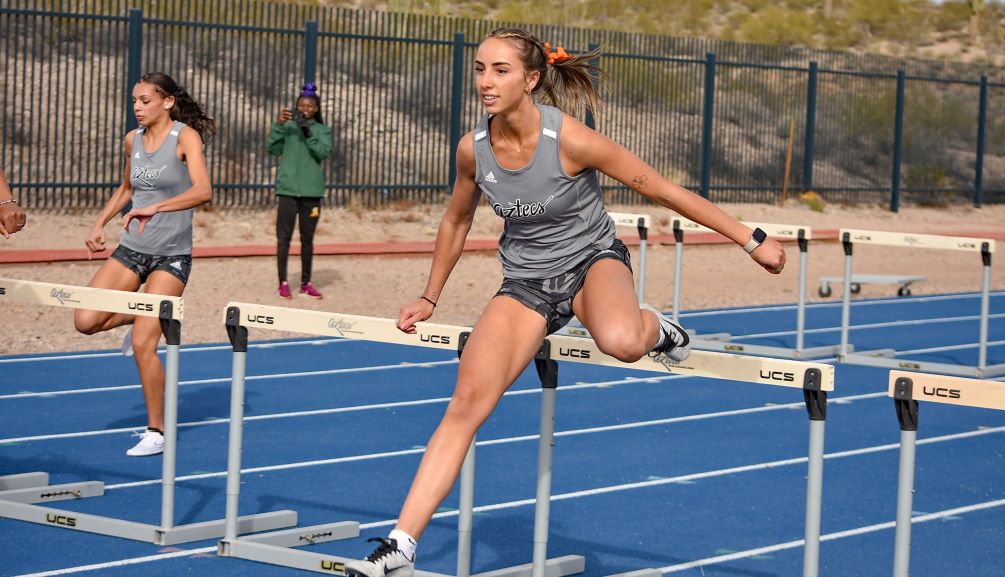 Freshman Tayler Crane improved on her national qualifying time in the 400 meter hurdles finishing in first place with a time 1:03.52 at the GCC Invitational. Photo by Ben Carbajal
