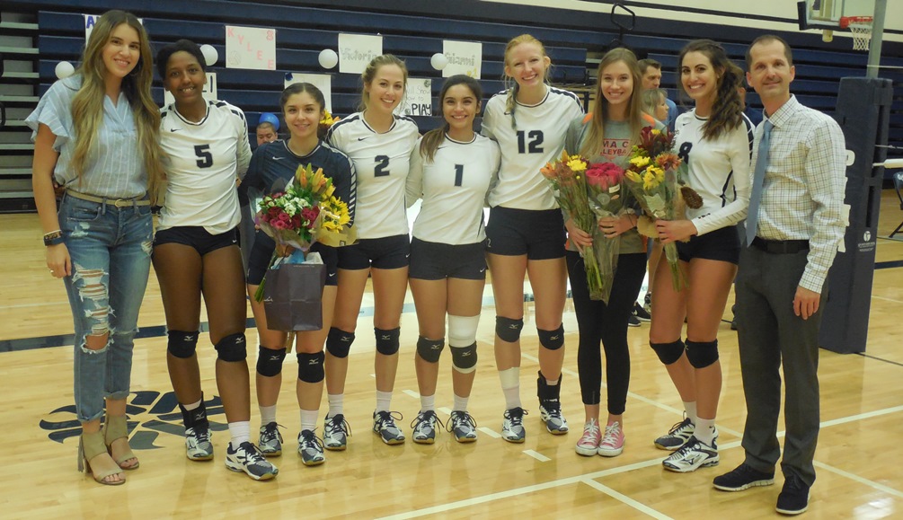 It was volleyball Sophomore Night in Pima's final match of the 2017 season. The Aztecs fell to Mesa Community College in straight sets to finish the season at 7-18 overall. (Left to right): Assistant coach Allison Rosas, Victoria Davis, Anissa Conrad, Kayli Riesgo, Gianni Romero, Jamie Ricksecker, Elyse Weber, Kylee Ashment and Head Coach Dan Bithell. Photo by Raymond Suarez