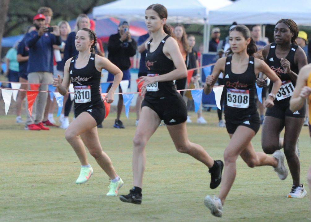 The Aztecs women's cross country team competed at the Dave Murray Invitational on Friday at the Tucson Country Club. Left to right: Freshman Kate Shoemaker, freshman Julia Lundberg, sophomore Marissa Lopez and freshman Iyannah Tolliver. Photo by Raymond Suarez
