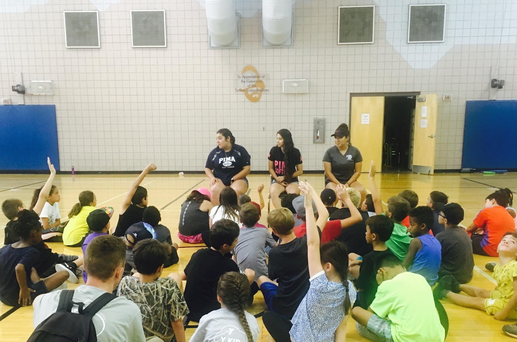 Softball players visit YMCA of Southern Arizona