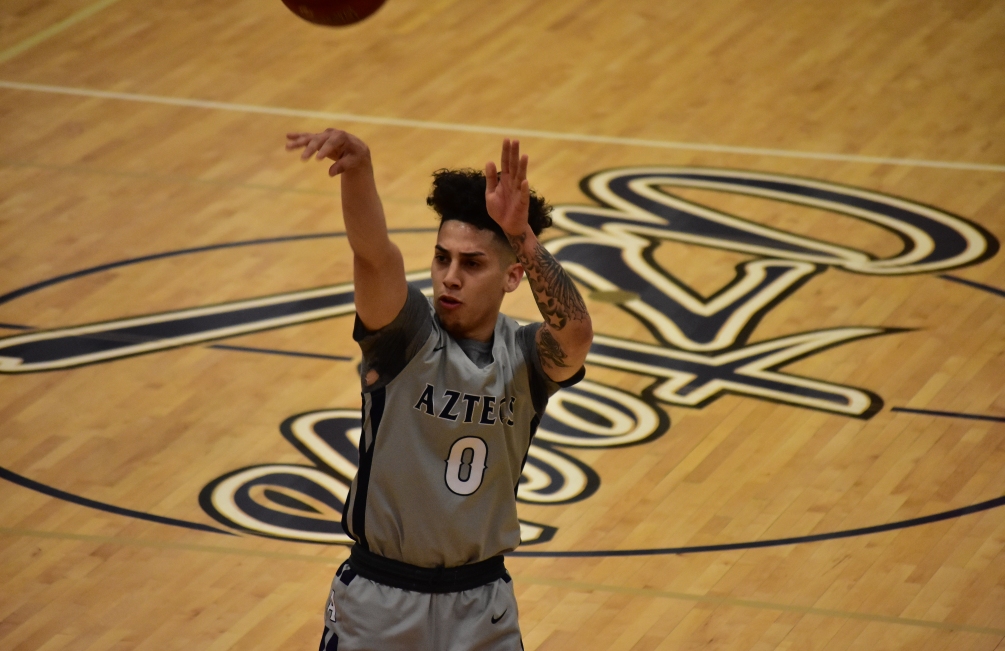 Sophomore guard Abram Carrasco (Cholla HS) became the seventh Pima men's basketball player to be named NJCAA All-American. He is the fourth player under coach Brian Peabody. Carrasco earned first team honors after he averaged 19.8 points on the season and set a new Pima school record with 1,310 points. Photo by Ben Carbajal