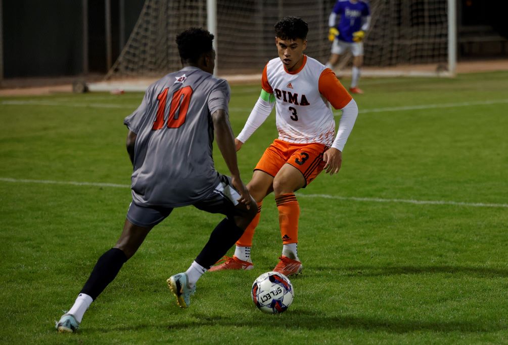 Sophomore Fernando Garate (Salpointe Catholic HS) challenges Southeastern's Jimson St. Louis but the No. 5 seeded Aztecs fell to the No. 9 Blackhawks 2-0. It was the third straight meeting between the two teams at the NJCAA Division II National Tournament. Photo by Stephanie van Latum