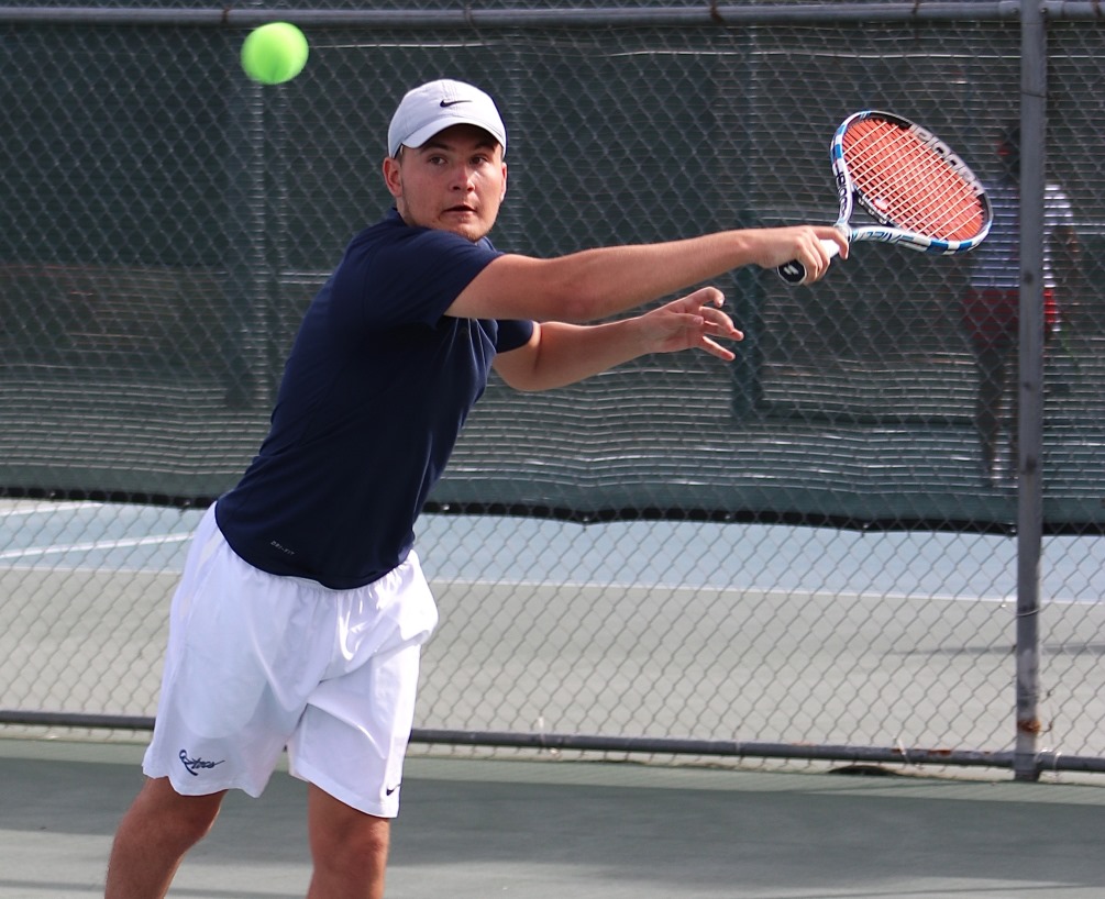 Sophomore Beau Boyer earned shutout wins in singles and doubles competition. He won his No. 2 singles match 6-0, 6-0 and along with Oscar Aguilera won their No. 1 doubles match 8-0. Pima beat Paradise Valley Community College 4-0 to improve to 2-1 on the season. Photo by Stephanie Van Latum