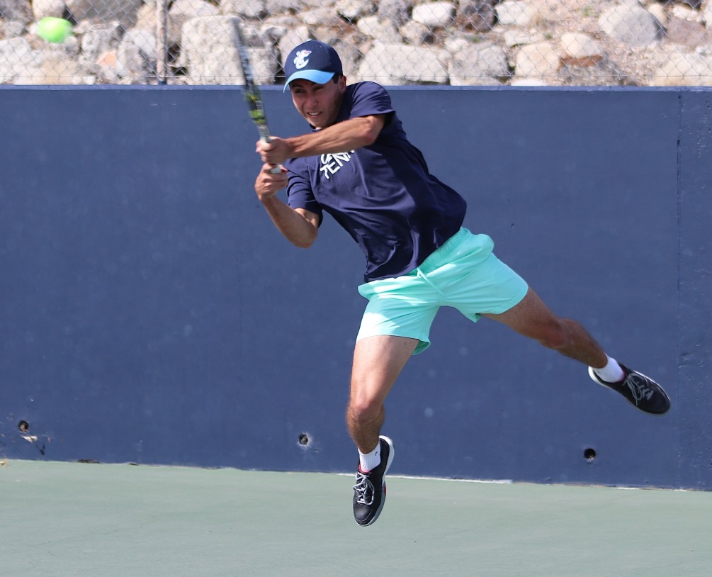 Freshman Oscar Aguilera advanced to the round of 16 in the No. 2 singles flight as he defeated Ken Herrmann from the College of Lake County 6-2, 6-0. He will play No. 7 ranked Cristobal Quevedo from Abraham Baldwin Agricultural College (GA) at 9:00 a.m. on Tuesday. Photo by Stephanie Van Latum