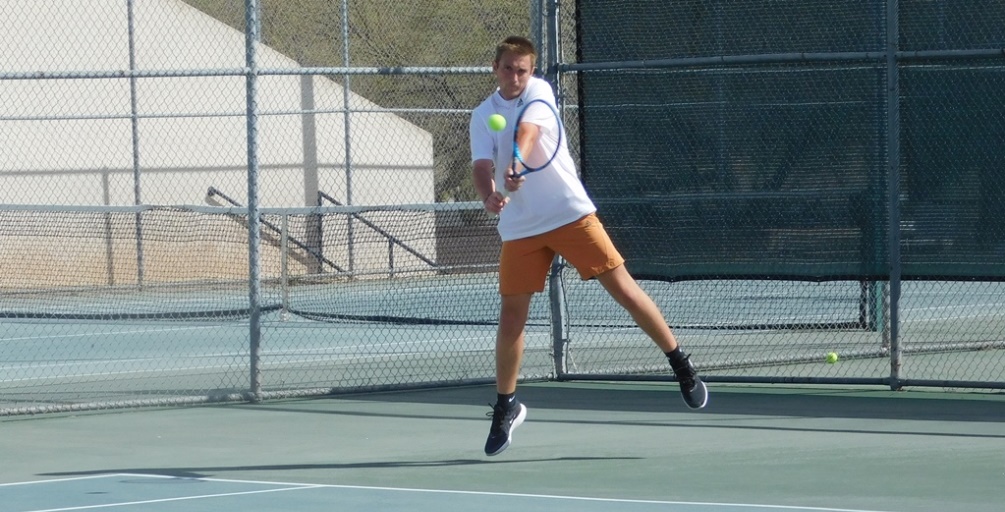 Sophomore Corey Pabst picked up two wins at No. 1 singles and No. 1 doubles. Along with the rest of his teammates, they will all play in their respected championships in singles and doubles play on Wednesday in the final day of the Region I Championships. Photo by Raymond Suarez
