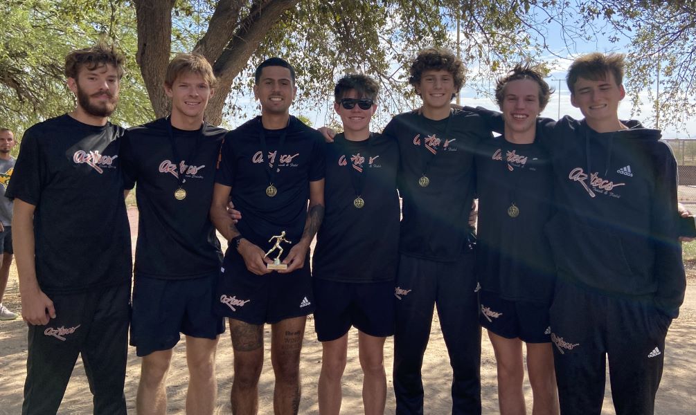 The Aztecs men's cross country team took second place with a team score of 33 points. They occupied five of the top 10 individual spots. (Left to right): Dale Snook, Justin VanDeberg (7th), Hall Griffith (3rd), Jace Schaub (10th), Evan Rasoumoff (9th), Declan Jorgenson (4th), Elijah Conroy. Photo courtesy of Mark Bennett.
