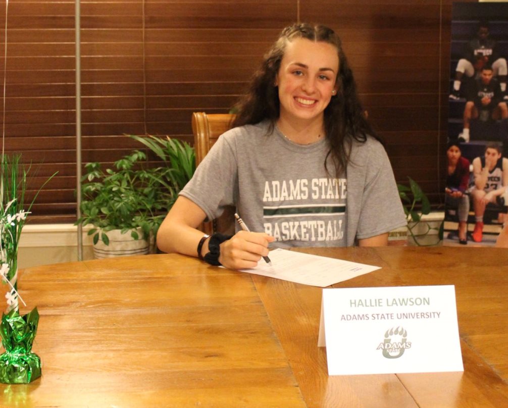 Aztecs women's basketball sophomore forward Hallie Lawson (Campo Verde HS) signed her letter of intent to play at Adams State University, an NCAA Division II school in Alamosa, CO. Lawson was named first team NJCAA All-American this season and earned NJCAA All-Academic First Team honors while playing both basketball and women's golf as a freshman. Photo courtesy of Hallie Lawson