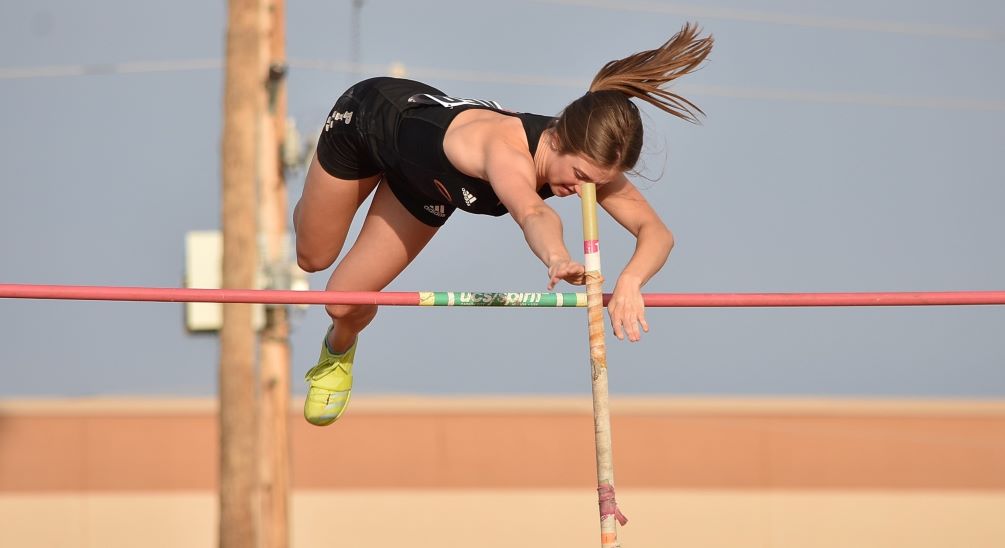 Freshman Jaida Olson (Pusch Ridge Christian HS) captured the Region I title in the Pole Vault with a winning mark of 3.36 meters (11-feet, 0.25-inches). The Aztecs lead in the team standings heading into the final day of competition on Thursday at Mesa Community College. Photo by Ben Carbajal
