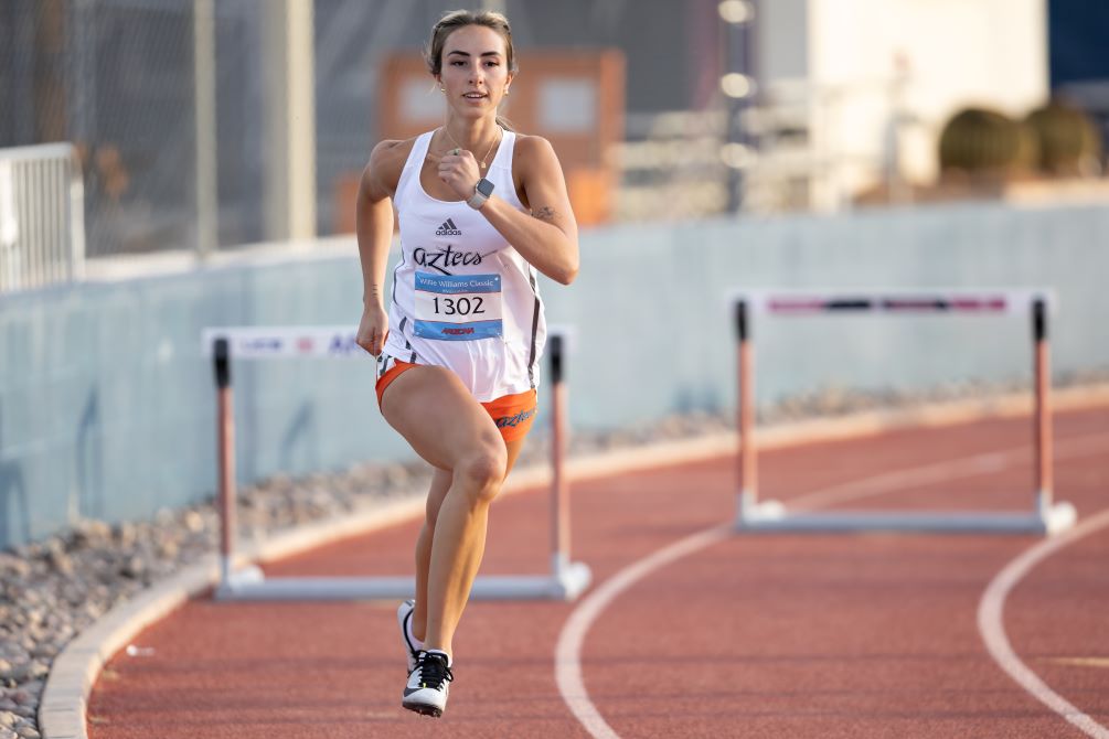 Freshman Tayler Crane earned a national qualifying time in the 400 meter hurdles (1:05.01) and moved to eighth on the Pima Outdoor school records list. Photo by Stephanie van Latum