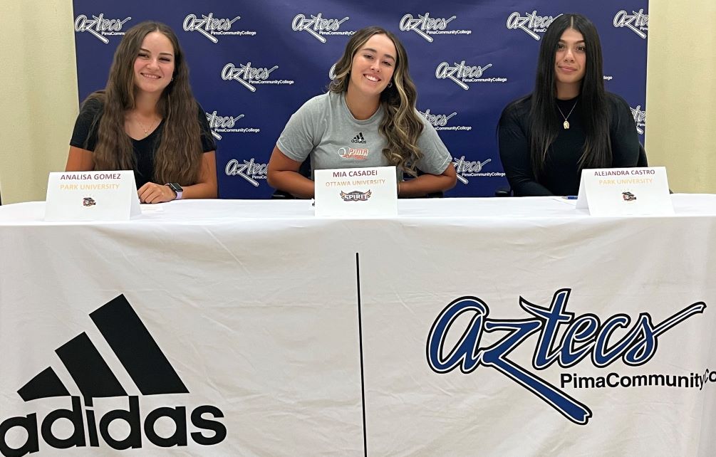 Three Aztec softball players signed their letters of intent to continue their collegiate careers in Arizona. (Left to right): Analisa Gomez (University HS) signed to Park University Gilbert, Mia Casadei will play at Ottawa University Arizona and Alejandra Castro committed to Park University Gilbert. The Aztecs locked up the No. 3 seed for the NJCAA Region I, Division I Tournament and will close the regular season on Saturday at Glendale Community College. Photo by Raymond Suarez